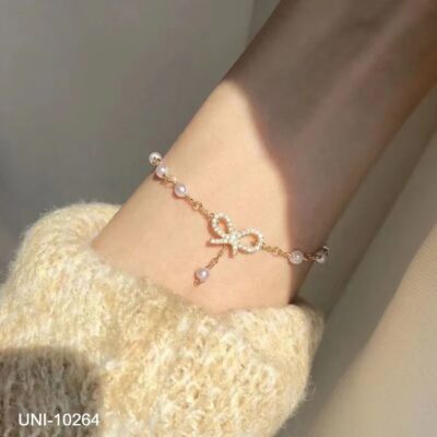 Pearl Bow Gold Bracelet